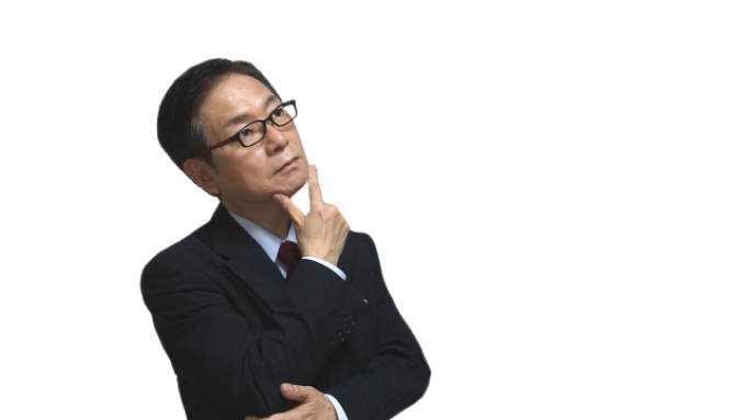 自己PRの内容を検討する40代男性のイメージ|営業職への転職を目指し、強みや伝え方を真剣に考えているビジネスマン